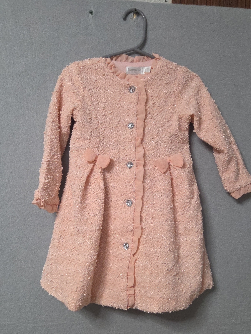 Nanette Baby Peach Textured Dress with Ruffle Front and Bows